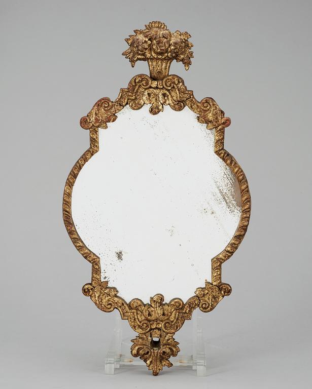 A late Baroque one-light girandole mirror.