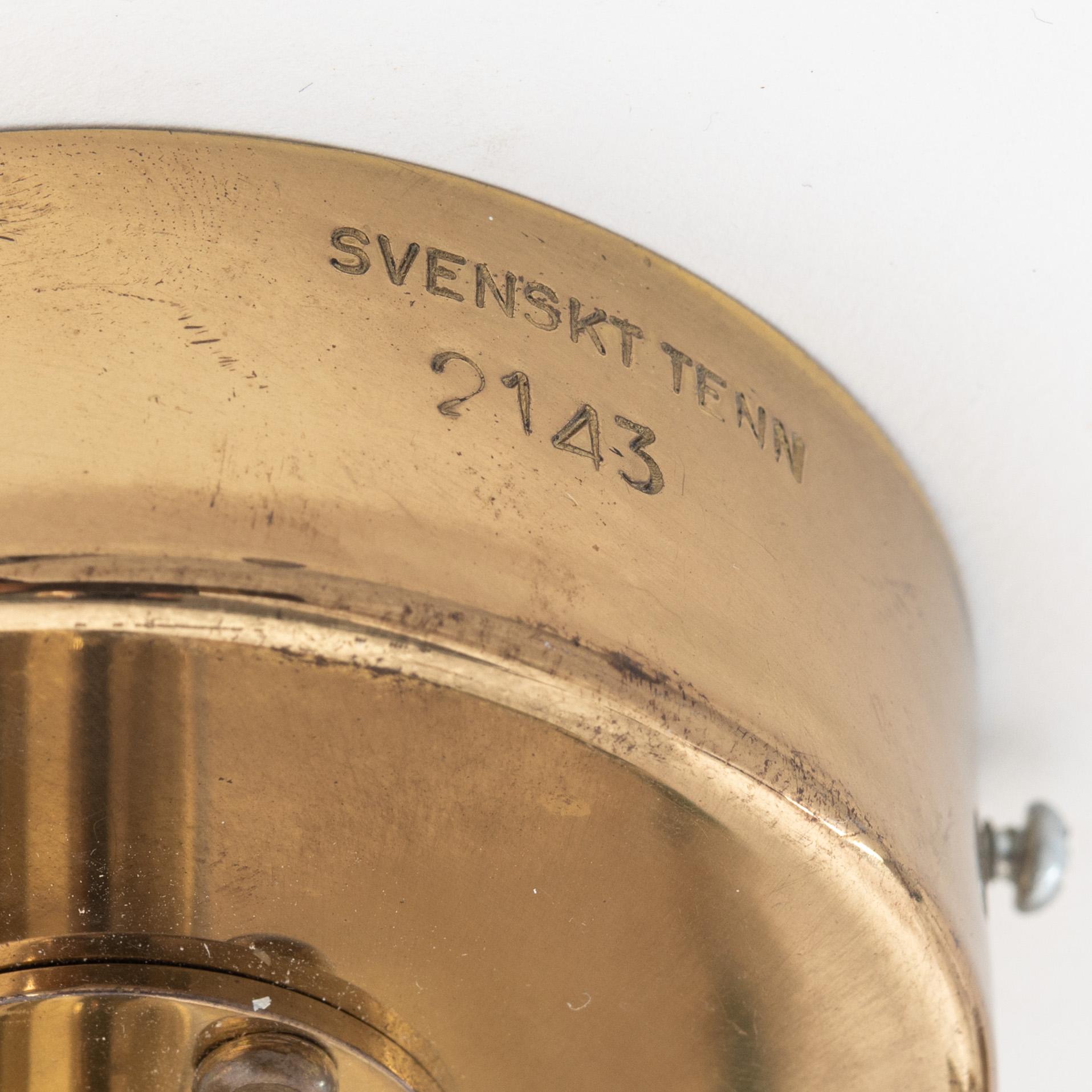 Josef Frank, a pair of model '2143' brass wall lamps, Firma Svenskt Tenn.
