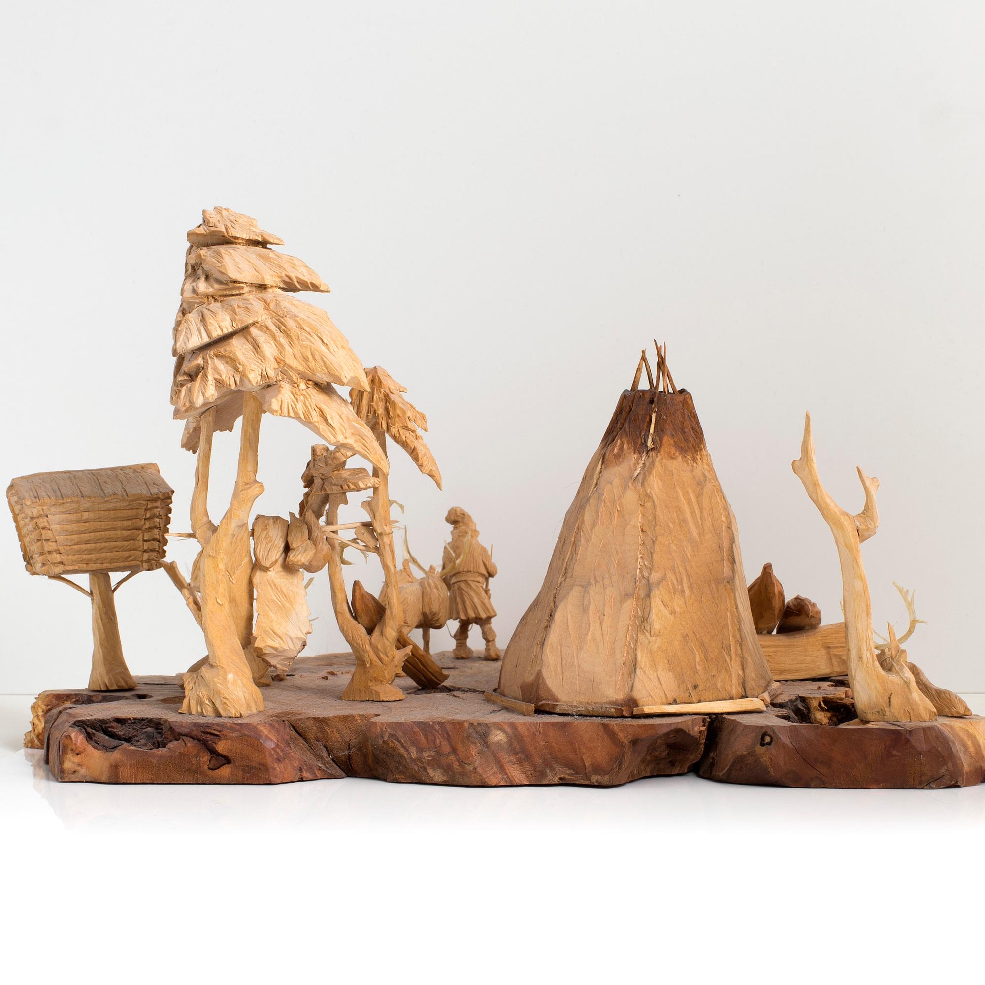 MARTIN STENSTRÖM, Jutsajaure, skulpturgrupp, snidat trä, signerad M.S. och daterad Jutsajaure 1987.