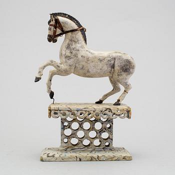 A painted folk art horse figure 19th century.