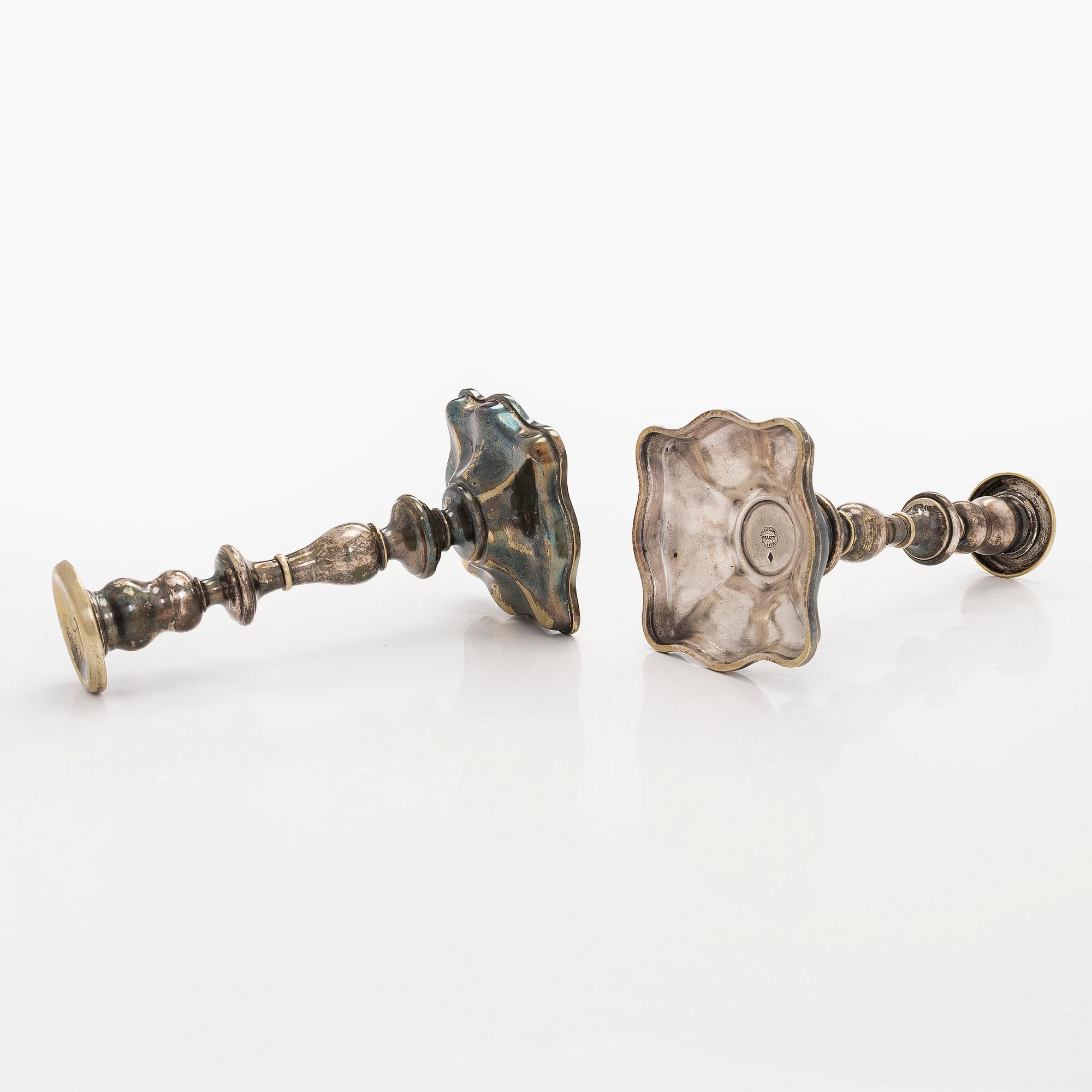 A pair of Fraget silver-plated candelsticks, Warsaw 1851-59.