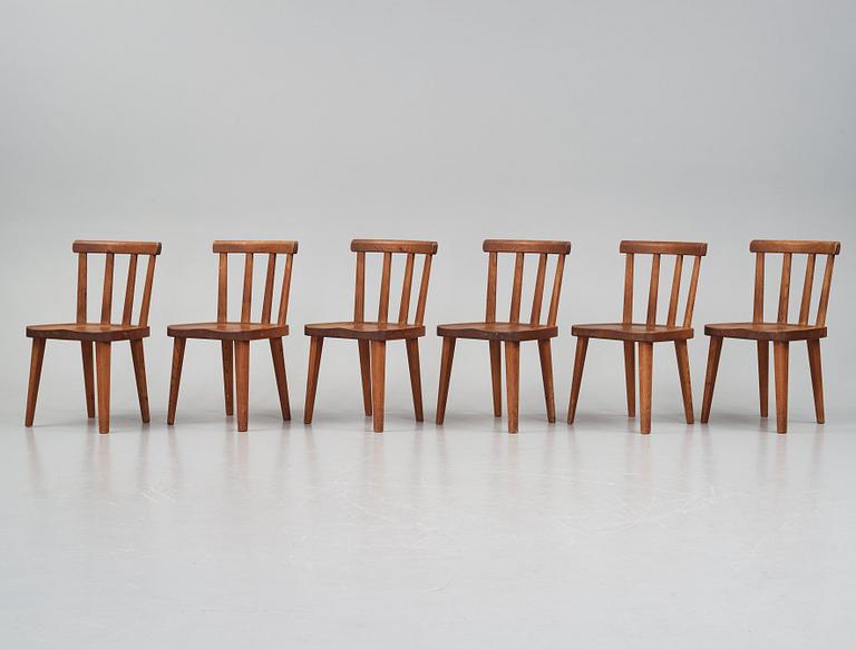 Axel Einar Hjorth, a set of six stained pine 'Utö' chairs, Nordiska Kompaniet, Sweden 1930s.