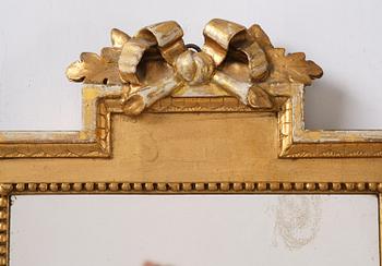 A Gustavian giltwood two-light girandole mirror by J. Åkerblad (master in Stockholm 1754-99).