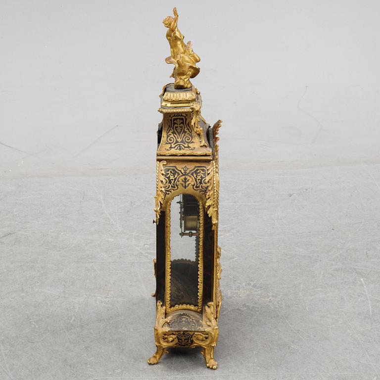 A French Boulle style mantel clock, 19th century.