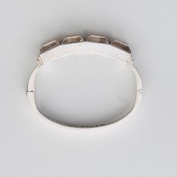 A Wiwen Nilsson sterling and four rockcrystals bangle, Lund 1937.