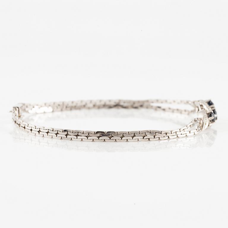 Arm bracelet, 18K white gold with small octagon-cut diamonds and sapphires.