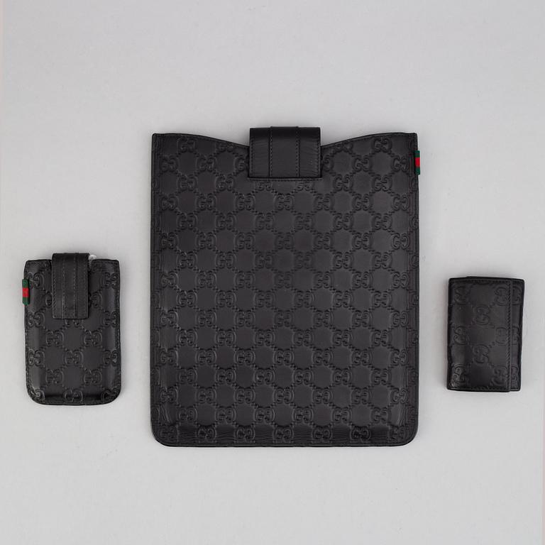 Gucci, ipad-case, key-case and mobile-case.