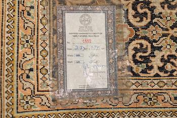 A silk carpet, Kashmir, c. 237 x 199 cm.