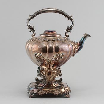 TEKANNA på RECHAUD, nysilver, rokokostil, troligen England, 1900-talets första del.