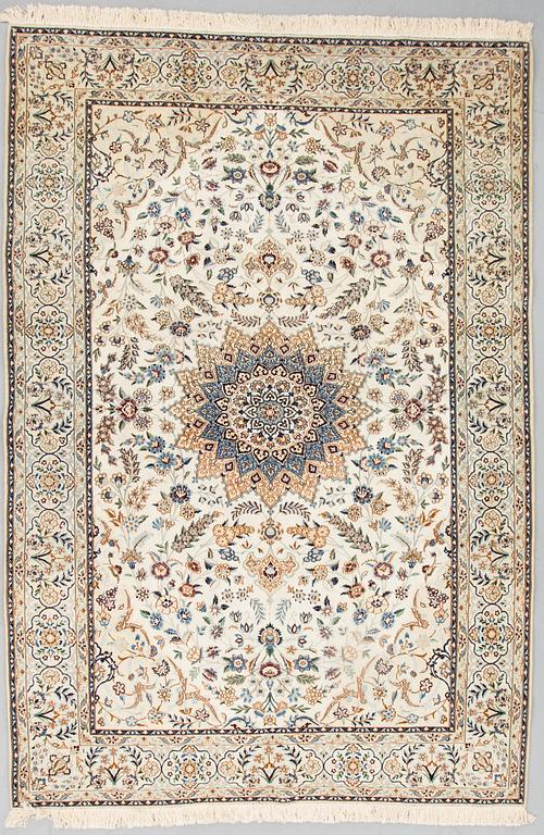 A carpet from Nain, Nain, part silk, 9 LAA, around 310 x 210 cm.