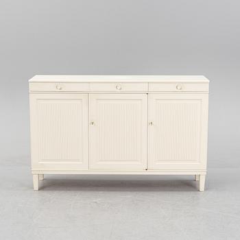 A 'Herrgården' sideboard by Carl Malmsten for Bodafors, dated 1963.