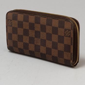 LOUIS VUITTON, a Damier Ebéne wallet.