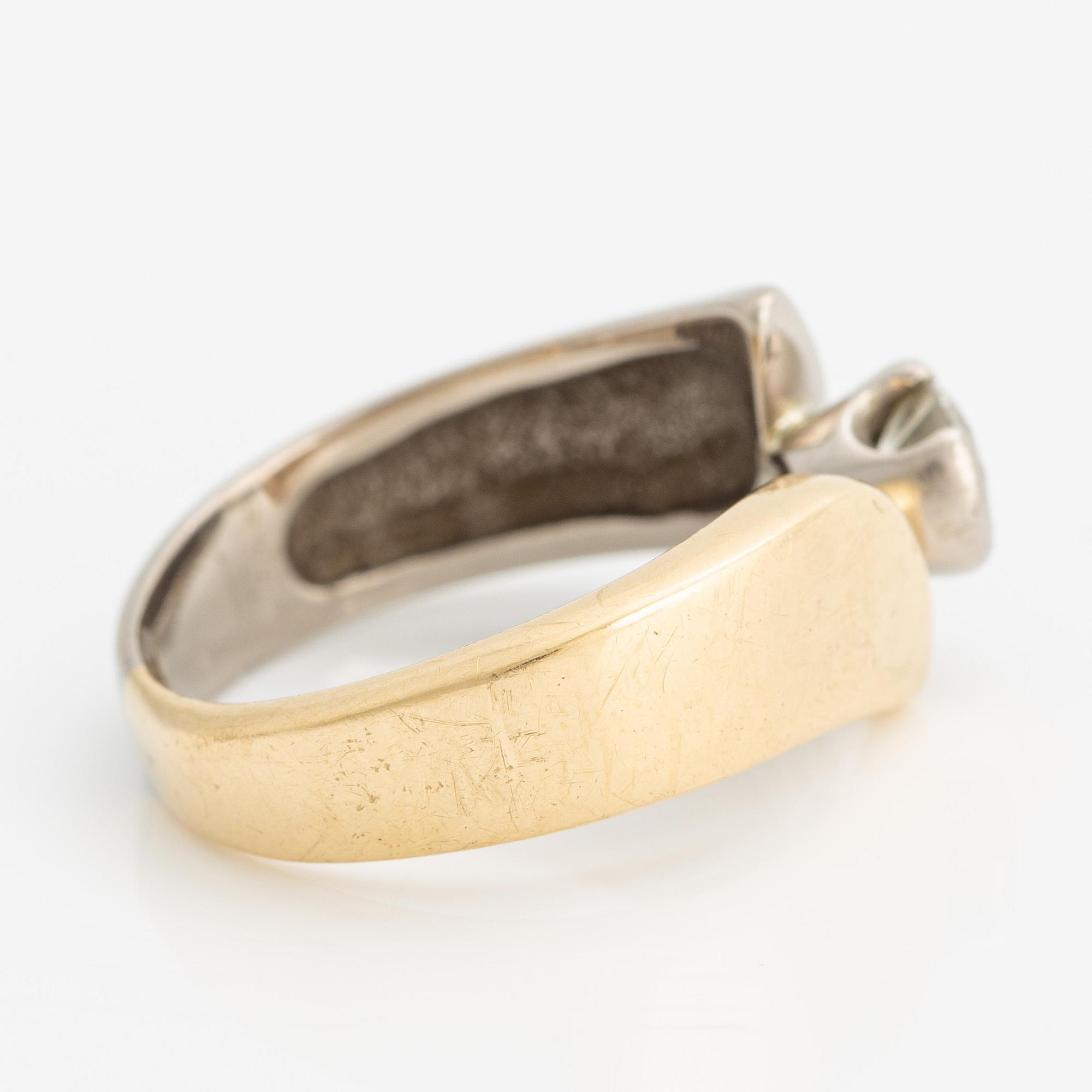 Ring 18K guld med en rund briljantslipad diamant.