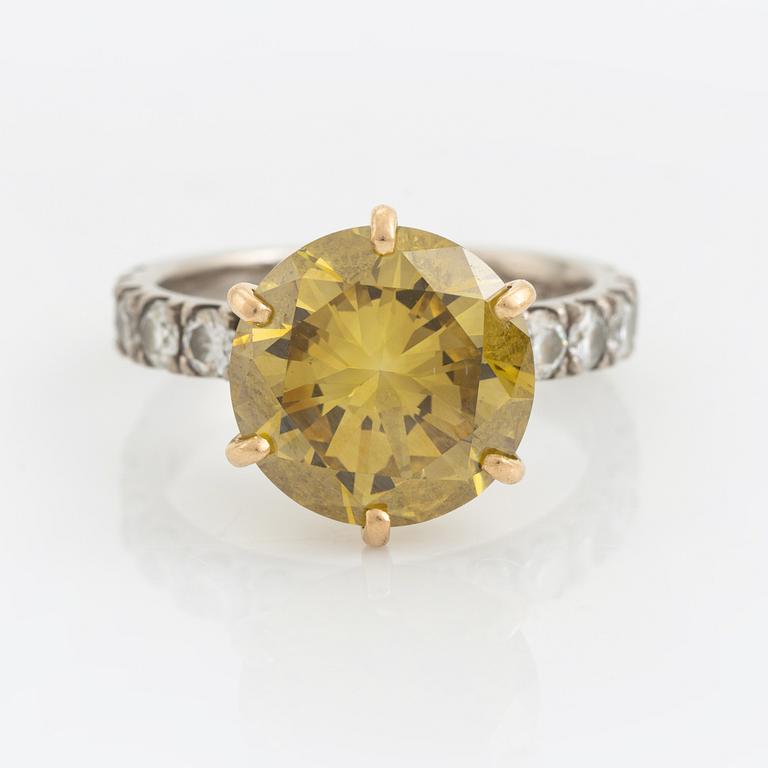 Colour treated yellow brilliant cut 6,20 ct diamond ring, Patrik af Forselles.