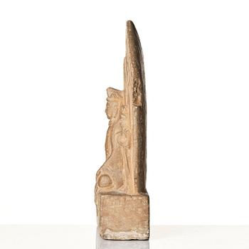 An inscribed limestone Buddhist stele, Tang style, with an inscription the third year of the Xian, corresponding to 672.