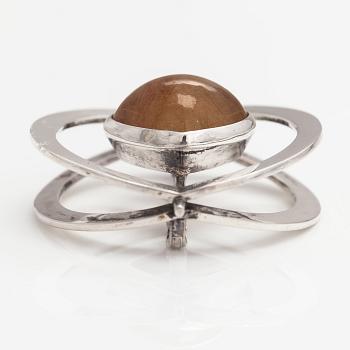 Elis Kauppi, A silver brooch/pendant with a rutile quartz. Kupittaan kulta, Turku 1961.