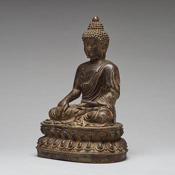 A bronze seated figure of Shakayamuni buddha, Mingtype.