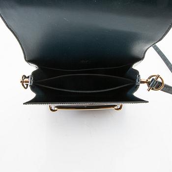 Hermès, bag "Green Shiny Alligator Mini Roulis 18 Permabrass Hardware" 2021.