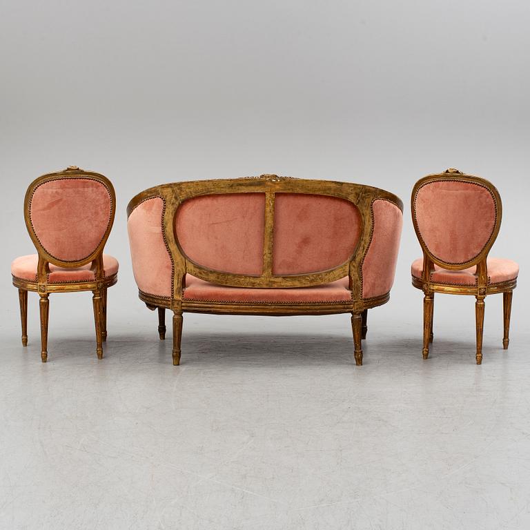 A sofa and a pair of chairs, Louis XVI-style, late 19th century.