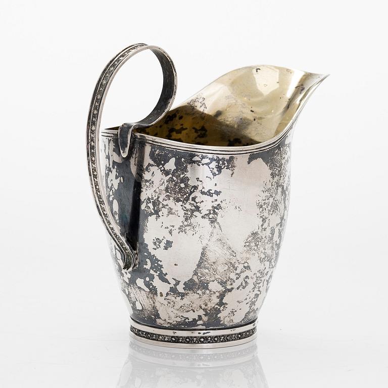 A 19th-century silver cream jug, maker's mark of Erik Sandström, Tornio, Finland 1833.