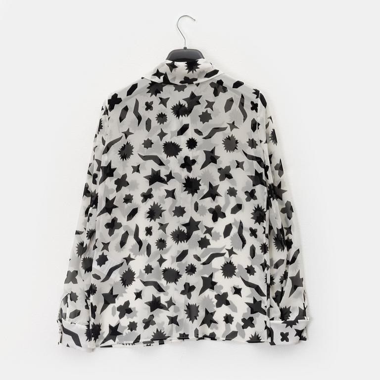 Yves Saint Laurent, a silk blouse, size 36.