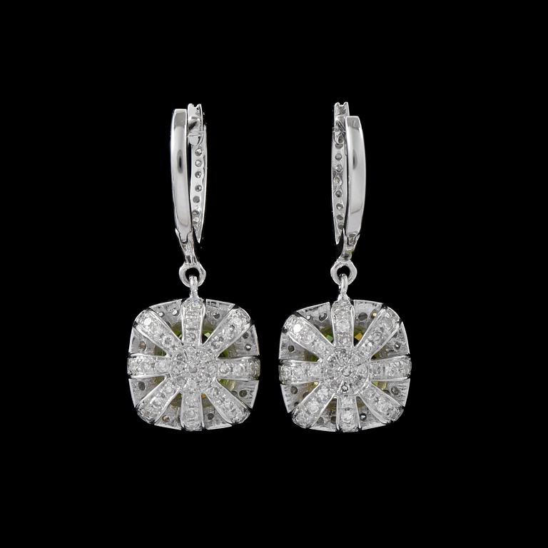 A pair of peridot, circa 5.30 cts, and diamond, circa total 1.10 cts, earrings.