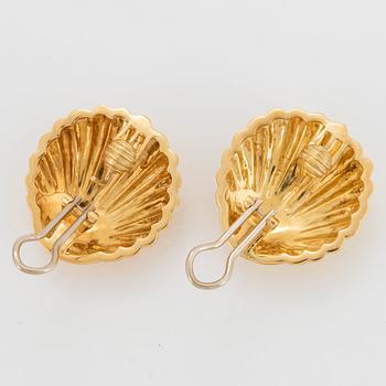 A pair of 18K gold earrings.