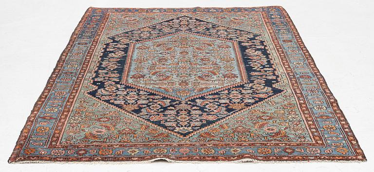 A carpet, semi-antique Hamadan, c. 199 x 128 cm.