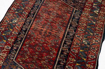 A Sarouk rug, west Persia, c. 197 x 128 cm.