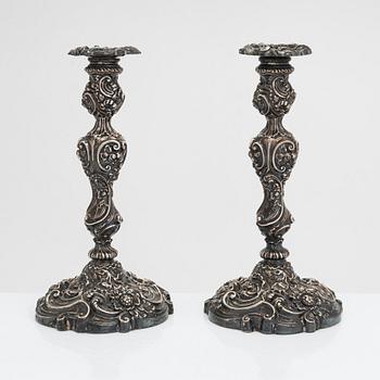 A pair of sterling candlesticks, maker's mark of Jenkins & Timm Shefield 1894.