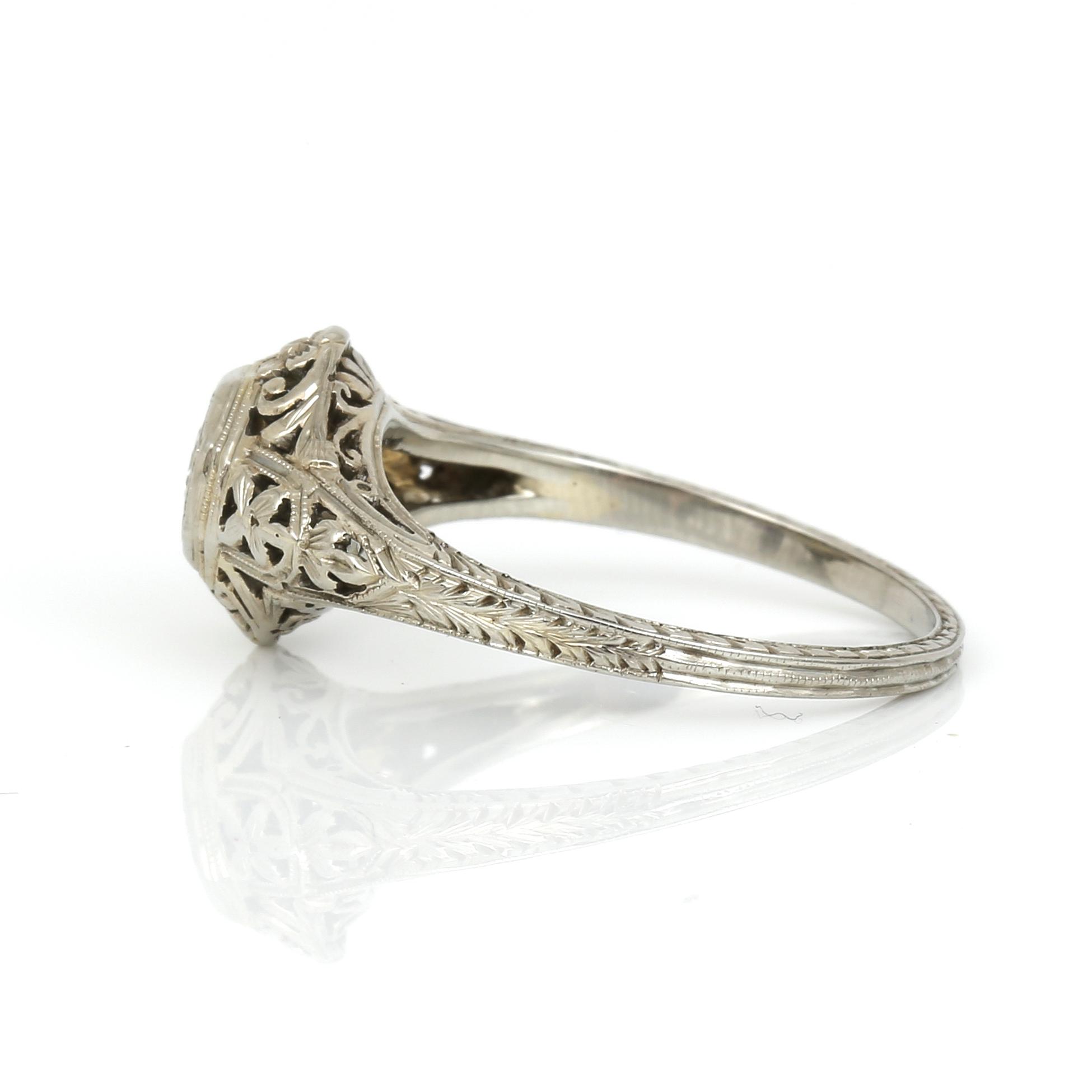 RING, 18K vitguld med briljantslipad diamant ca 0,20 ct, USA, 1900-talets första hälft. Total vikt ca 2,37 g.