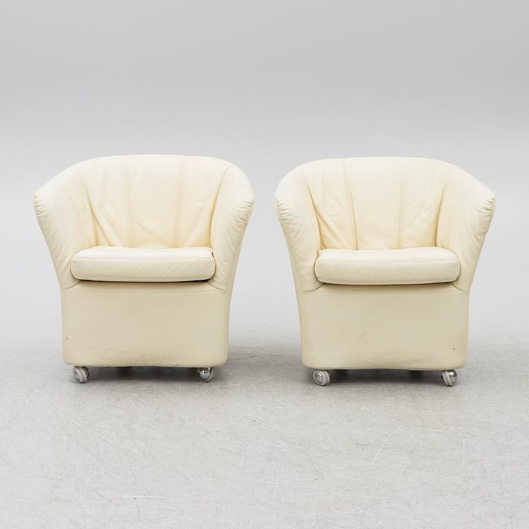 A pair of leather armchairs, Dux, Sweden, 1980's.