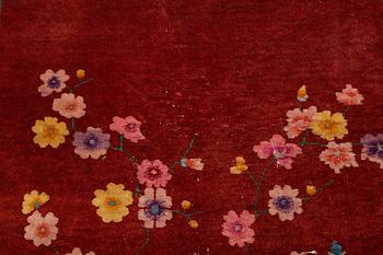 A semi-antique chinese carpet, ca 338 x 266 cm.