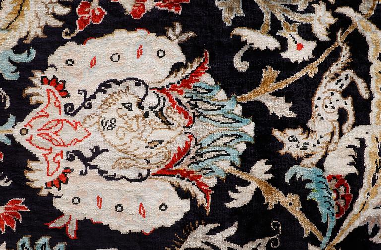 A carpet, Figural Silk Qum, ca 309 x 200 cm.