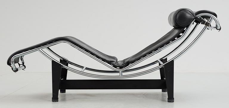 A Le Corbusier 'LC 4' black leather and chromed steel reclining chair, Cassina, Italy.