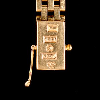 DAMARMBANDSUR, 18 k, Omega. Vikt m urverk ca 27 g.