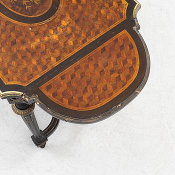 A Louis XVI style table, second half of the 19th century.