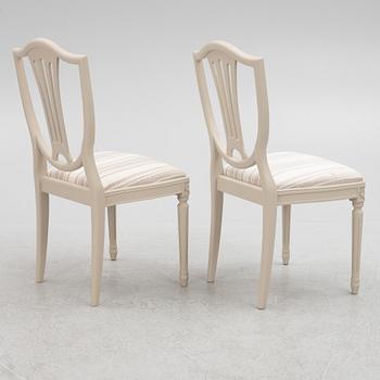 A Gustavian Style Dining Table and 10 Chairs, second half of the 20th Century.
