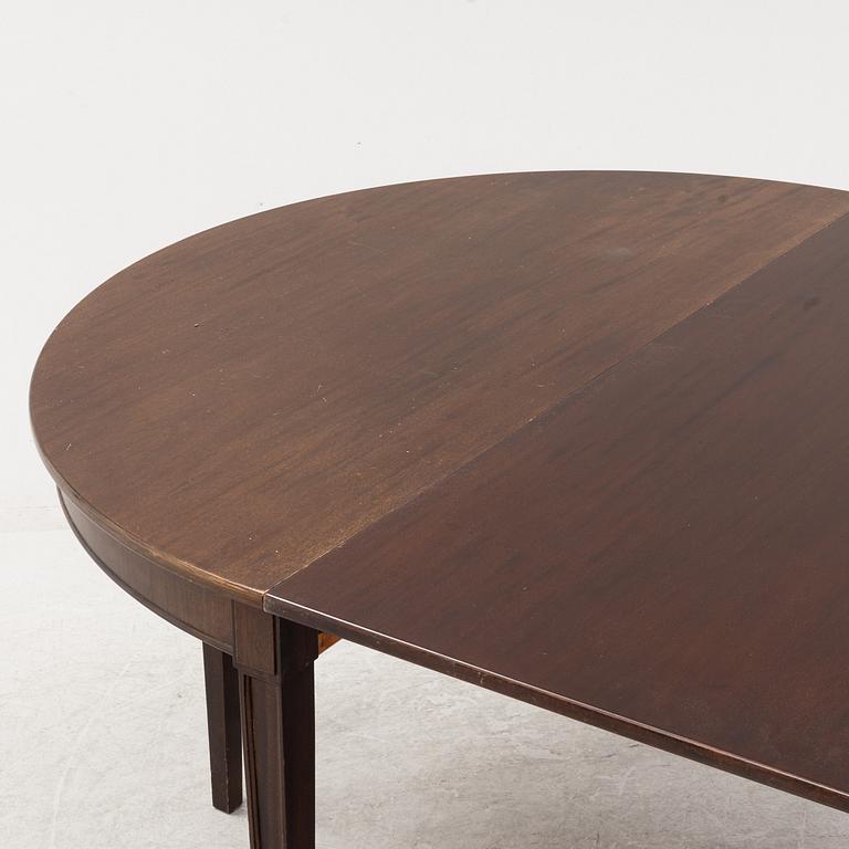 A Gustavian style dining table.