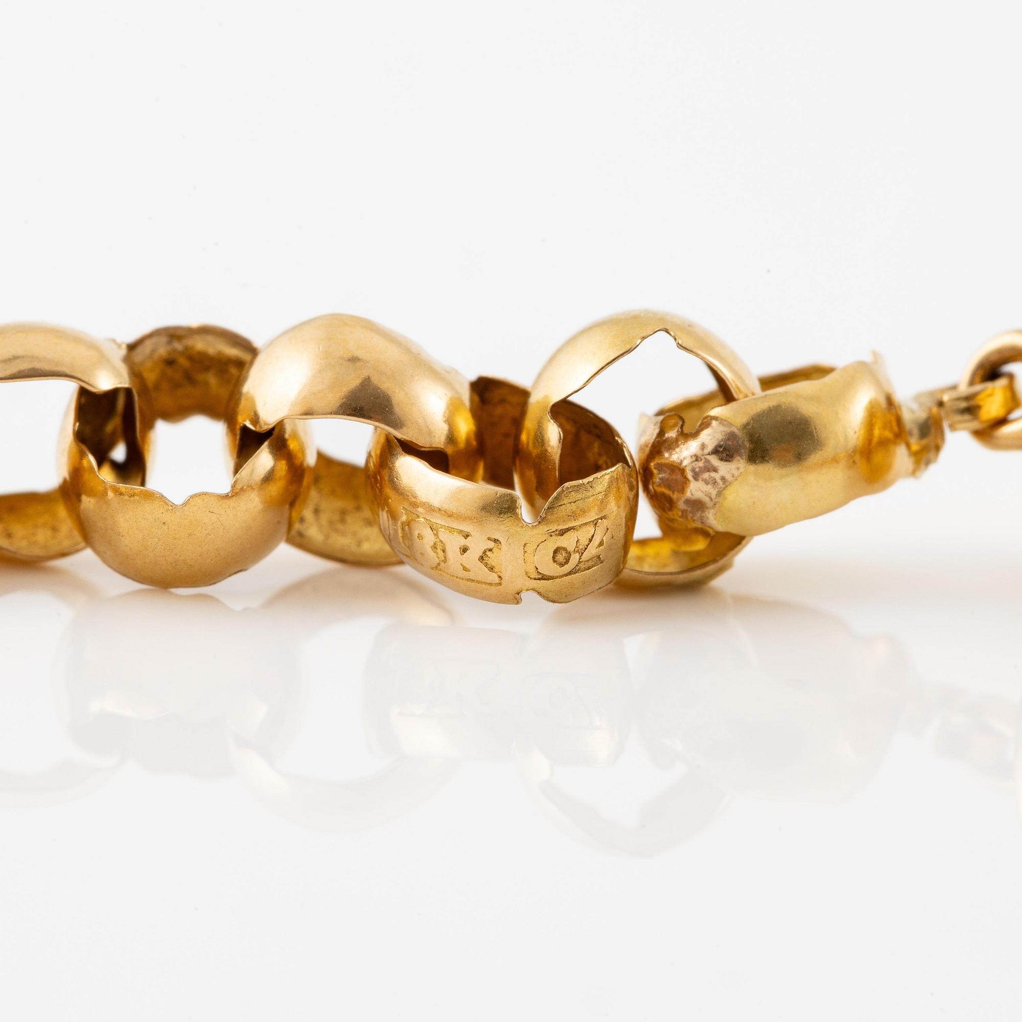 An 18K gold chain.