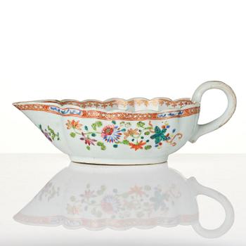 A group of famille rose 'double peacock' serving dishes, Qing dynasty, Qianlong (1736-95). (8 pieces).