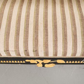 A gustavian style table and sofa, around the year 1900.