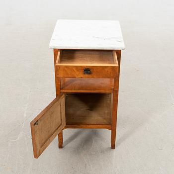 Bedside table with marble top, 20th century.