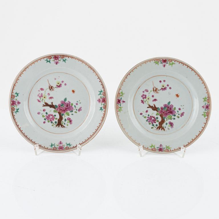 Twelve Famille Rose plates and two small plates, China, Qianlong (1736-95).