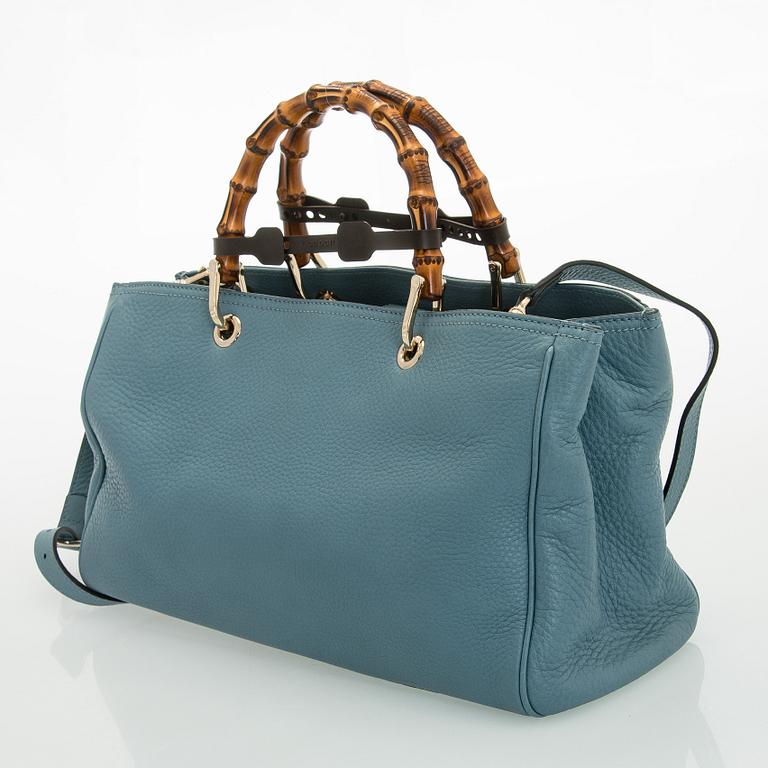 Gucci, a 'Bamboo shopper' bag.