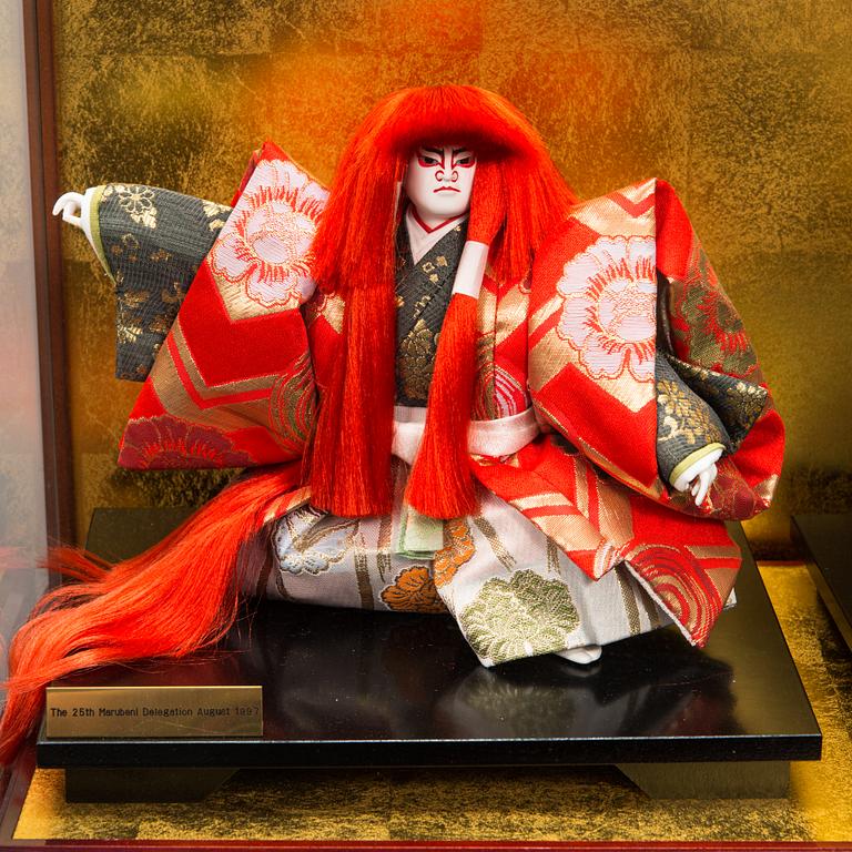 Four late 20th century Japanese dolls.
