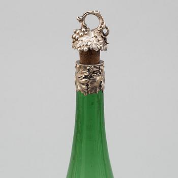 A silver mounted winebottle, Birmingham 1839.