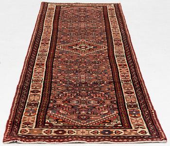 A runner  carpet, Hamadan, 305 x 80 cm.