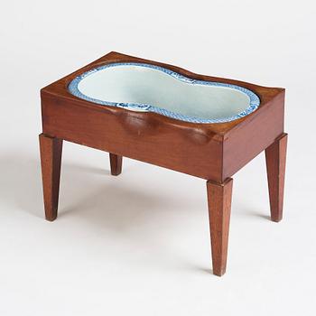 A blue and white bidet with a wooden stand, Qing dynasty, Qianlong (1736-95).