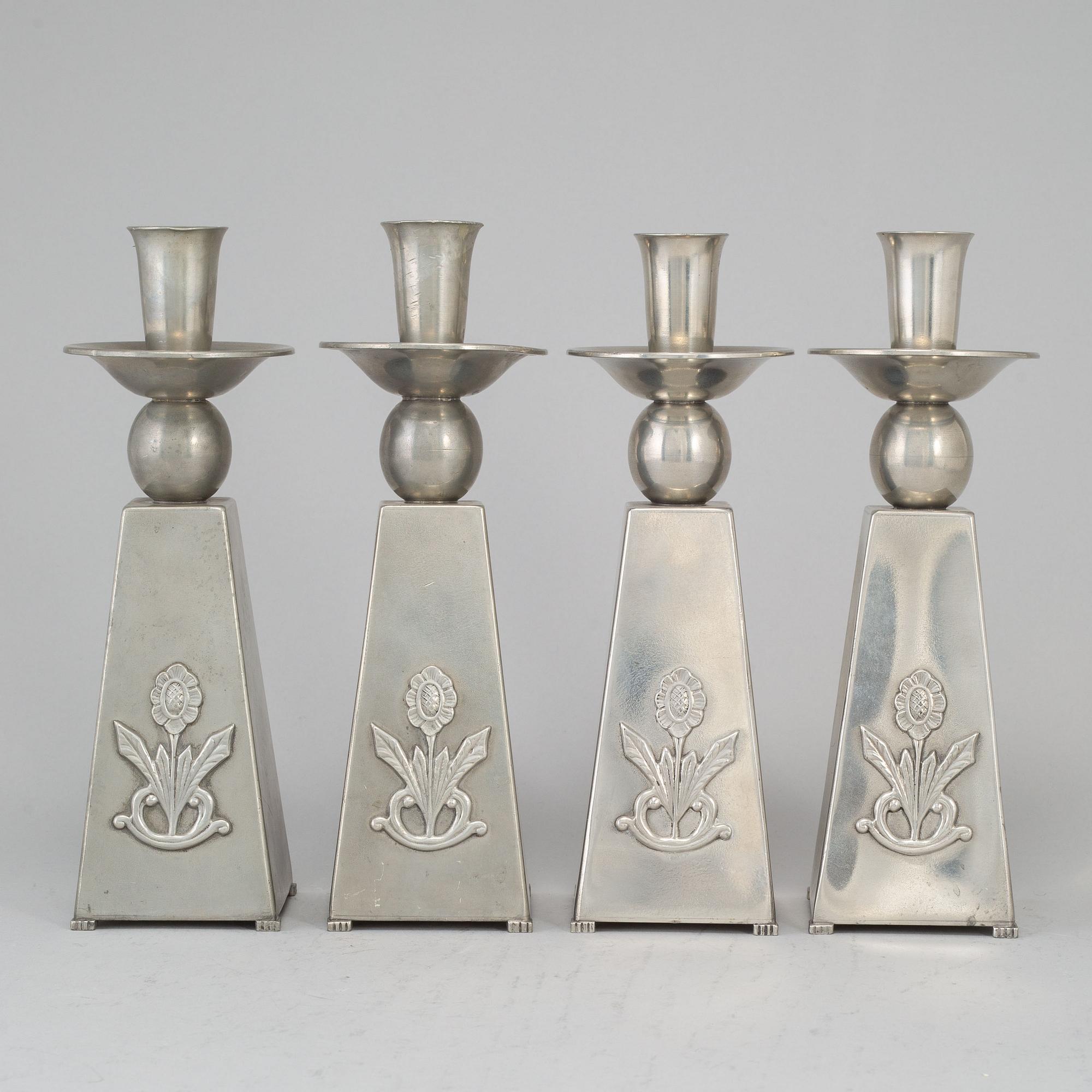 GAB (Guldsmedsaktiebolaget) TENN, a set of four pewter candlesticks, Stockholm 1950's.
